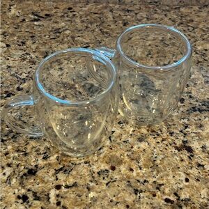 2 clear coffee mugs